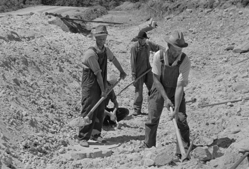 Scottsboro (vicinity), Alabama. Farmers who have been resettled at work in a sand pit at Cumberland Mountain Farms, a U.S. Resettlement Administration project, photo by Arthur Rothstein, 1935.
